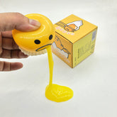 Funny Stress Relief Squeeze Toy - Creative Vomiting Egg Yolk Character with Yellow Slime for Novelty Gags and Sensory Play